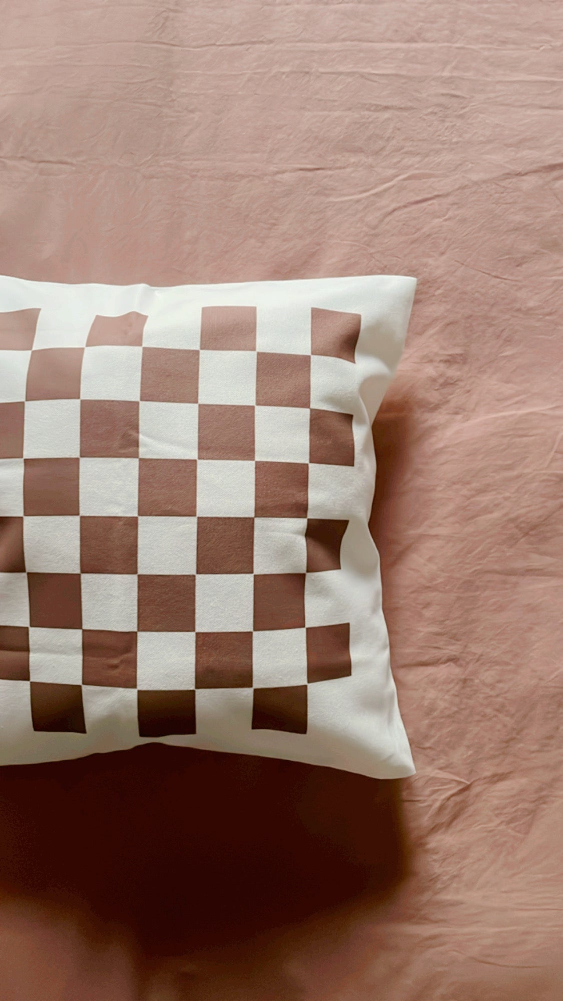 Chocolate Checkerboard cushion cover.