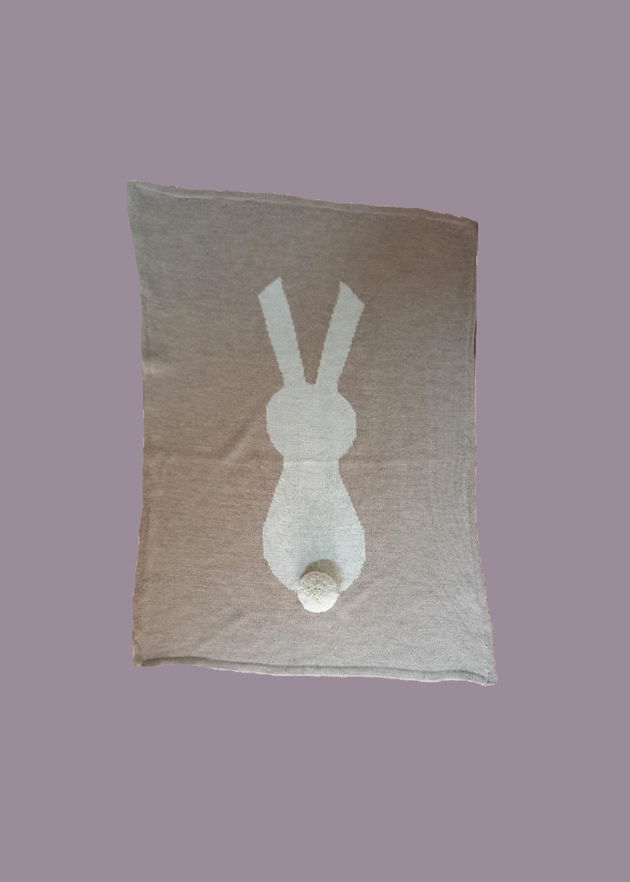 White bunny on beige